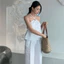 Set thiết kế áo trắng cổ yếm khoen ngực + quần suông MyaHouse