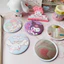 【Roshy】Gương nhỏ hình trái tim Melody Girl Gương tròn nhỏ sáng tạo Gương cầm tay hoạt hình Sanrio