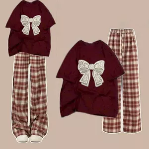 Bộ quần kẻ dài caro đỏ+ và áo phông unisex hình nơ trắng to -chang3158