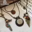 Nhíp cổ điển boho với kim loại và lông vũ, dây xích mặt dây chuyền handmade dành cho nữ