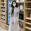 Áo len dệt kim tay phồng cổ chữ V phiên bản Hàn Quốc, màu trắng thanh lịch cho mùa hè