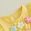 Trang phục mùa hè cho bé gái mới biết đi Trang trí hoa Áo cổ tròn tay bay + Quần short lưng co giãn Bộ quần áo 2 chiếc
