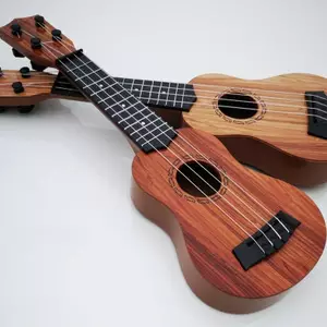 Đồ chơi đàn Guitar trẻ em có thể được sử dụng để chơi nhạc cụ tiểu học có mái chèo mô phỏng đồ chơi âm nhạc Yukrili đẹp