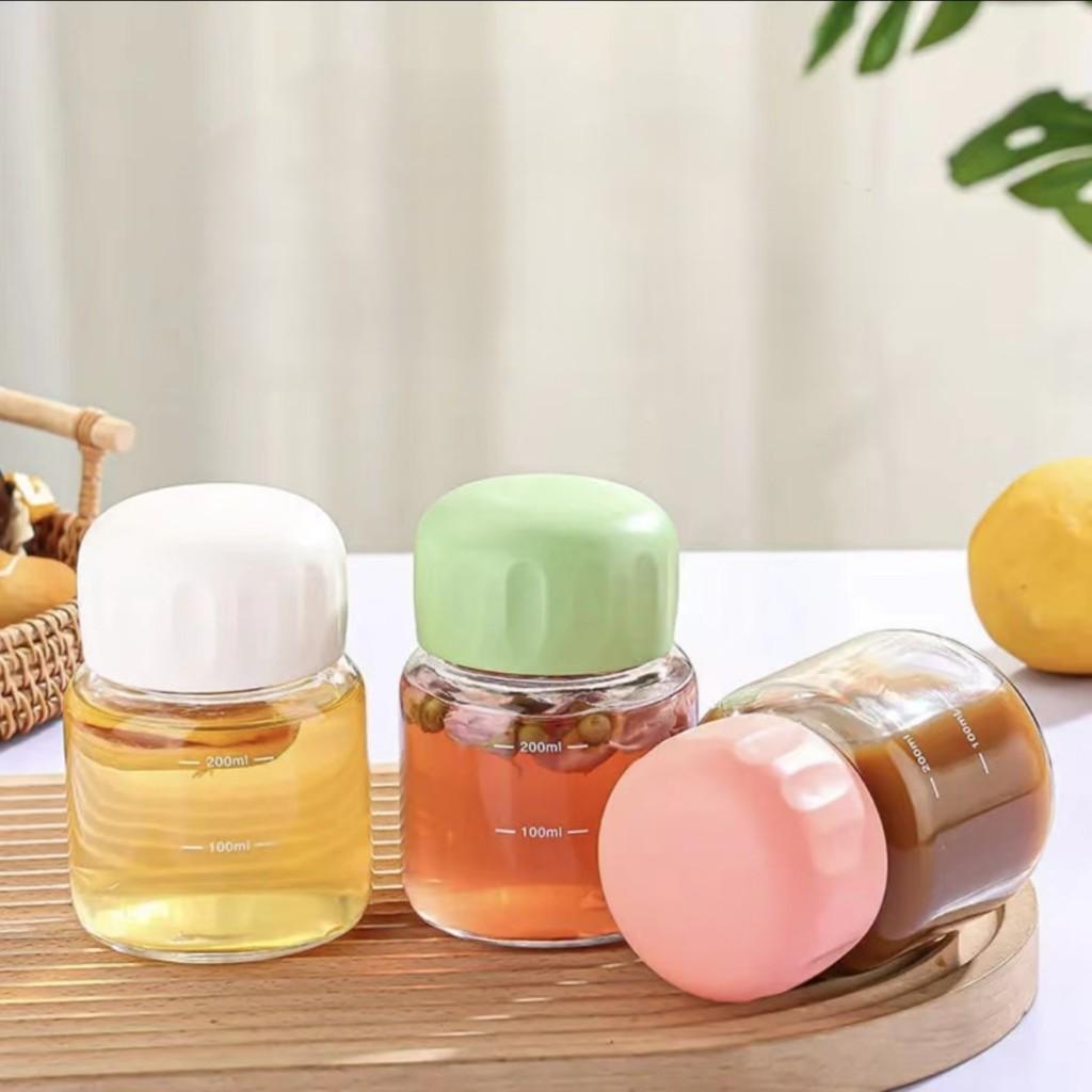 Cốc Thủy Tinh Mini 300ml In Hình Đôi Mắt Cute – Bình Nước Chia Vạch Dáng Lùn Đáng Yêu