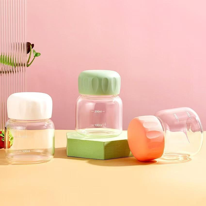 Cốc Thủy Tinh Mini 300ml In Hình Đôi Mắt Cute – Bình Nước Chia Vạch Dáng Lùn Đáng Yêu