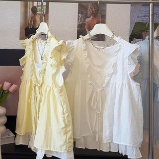 Màu sắc tương phản kem vàng ngọt ngào, áo sơ mi búp bê không tay ren, phong cách Hàn Quốc mới lạ cho mùa hè 2026
