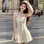 Đầm chữ A mini tweeduj trắng, xẻ ngực nút và xếp ly, gợi cảm cho nữ