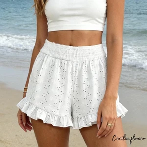 Quần short xù nữ dáng rộng thêu eo thun Quần short mùa hè cho kỳ nghỉ đi biển