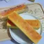 FUHUIOT Đồ chơi bóp phục hồi chậm, Đồ chơi ép que bơ lớn bằng tay co giãn, Đồ chơi nhào 24cm Đàn hồi Thư giãn Quà tặng Thanh bánh phô mai thực tế Trẻ em