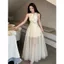Đầm nữ cao cấp với nơ lưới khâu và thiết kế giác hẹp eo ôm