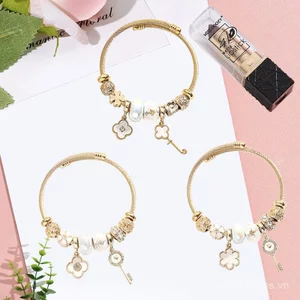 Pandora DIY Vàng Vòng Tay Thép Không Gỉ Nữ Ánh Sáng Sang Trọng Phù Hợp Với Kim Cương Bốn Lá Hoa Đính Hạt
