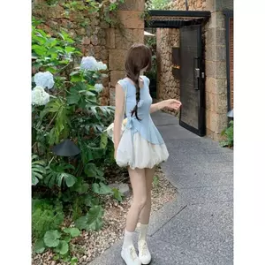 Phong cách nhẹ nhàng Áo Vest không tay không đều Bộ đồ nữ mùa hè eo cao thon gọn hơn Thiết kế váy hoa Bud Thiết kế cảm giác có dây buộc