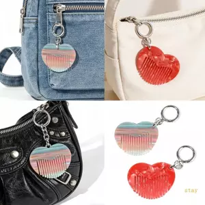 Móc khóa lược tóc mini sành điệu, tiện lợi cho du lịch và sử dụng hàng ngày