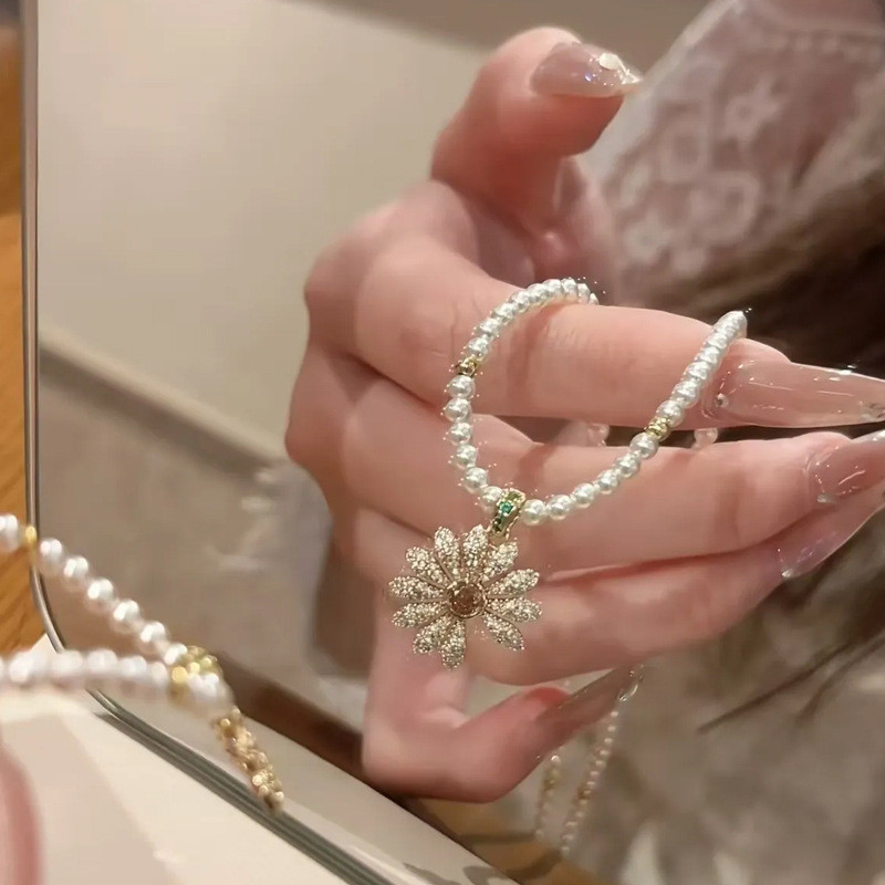 Vòng cổ ngọc trai hoa cúc Zircon thời trang