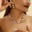 Trang sức bộ bông tai ngọc trai và lá kim cương giả, thanh lịch cho bữa tiệc từ Nelace