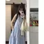 Mẫu váy dài không tay cổ tròn màu xanh với thiết kế eo cao và form ômbody