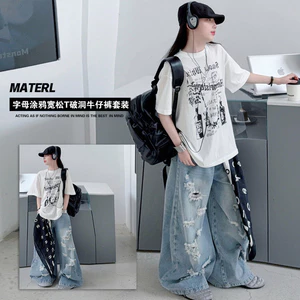Áo thun nữ chữ Graffiti dáng rộng Mùa hè Phong cách mới Thời trang trẻ em Phiên bản Hàn Quốc Áo nhẹ