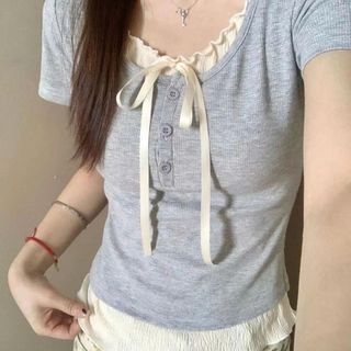 Áo thun tăm cộc tay phối bèo buộc dây cổ tròn . Mẫu mới