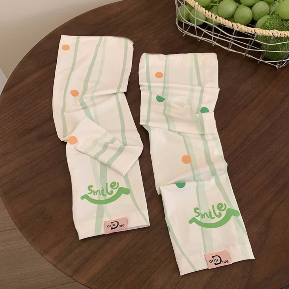 Tay áo đi xe đạp nữ in hình hoạt hình, lụa băng chống tia cực tím, tay áo rộng đa năng ngoài trời mùa hè