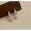 Retro khí chất mát mẻ nút tre giọt nước zircon rỗng bông tai nữ đa năng cá nhân