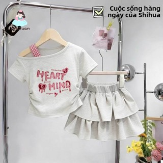 Bộ đồ bé gái mùa hè vai lệch - Áo chữ tim cá tính phối chân váy xếp tầng dễ thương phong cách Hàn