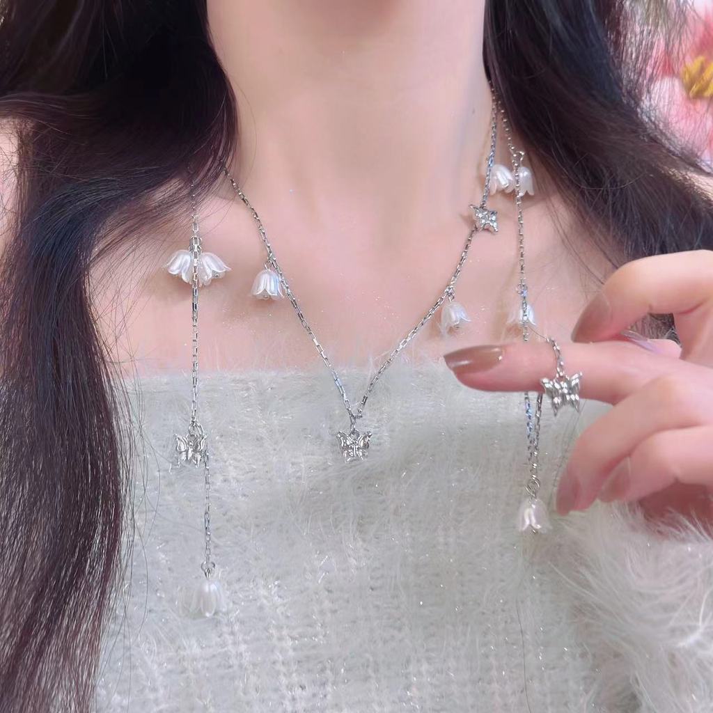 Đáy chuyền nữ thời trang Pháp với ngọc trai và họa tiết bướm, hạt chuông, thiết kế đa năng và cá tính