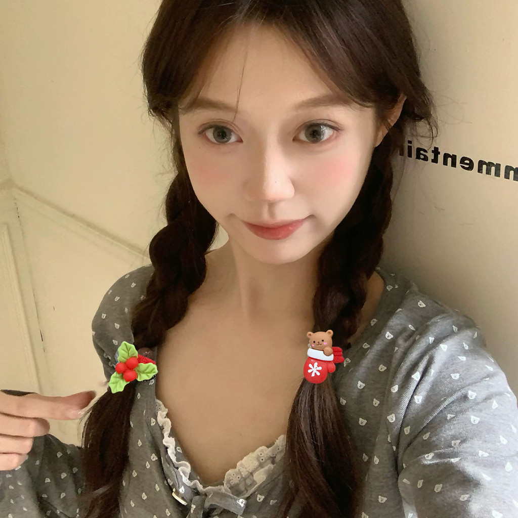Bộ dây buộc tóc Terry 10 chiếc họa tiết tuần lộc và ông già Noel, phù hợp cho các bữa tiệc hoặc họp mặt gia đình trong dịp lễ hội Giáng sinh.