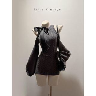 Áo len nữ mềm mại thiết kế mới với nơ sáp và chi tiết ren dây retro phù hợp mùa thu đông.