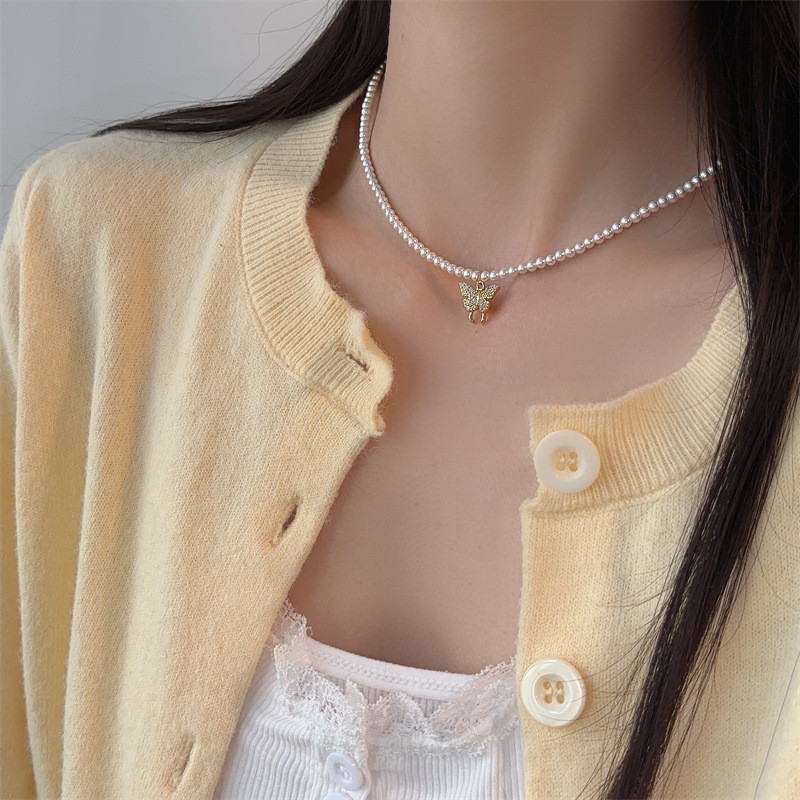 Vòng cổ ngọc trai mặt dây chuyền hình bướm sang trọng và đa dụng