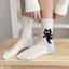 Tất họa tiết mèo đáng yêu ở bắp chân, thiết kế dễ thương cho nữ, làm từ cotton cao cấp, thoải mái và chống trượt khi sử dụng hàng ngày.