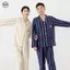 Bộ đồ ngủ cặp đôi phong cách Nhật Bản Muji, thiết kế thêu gấu và sọc, làm từ cotton nguyên chất, phù hợp mùa thu đông.