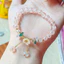 Vòng tay hạt thủy tinh và acrylic hình hoa camellia, phù hợp làm đồ thủ công DIY