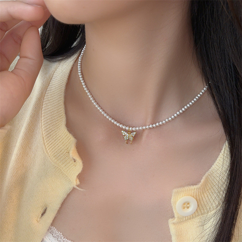 Vòng cổ ngọc trai mặt dây chuyền hình bướm sang trọng và đa dụng
