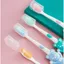 Túi 4 bàn chải trẻ em lông mềm hình thú đứng dễ thương, kèm đế hút và nắp chống bụi