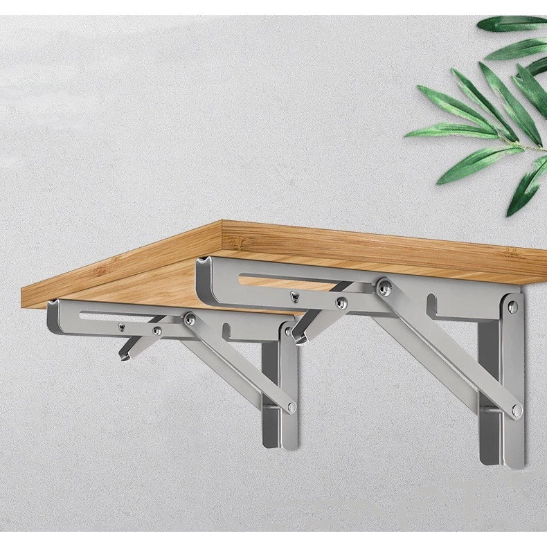 Chân máy gấp gọn, bản lề gấp thông minh, tải trọng 90 kg, làm bằng thép không gỉ.