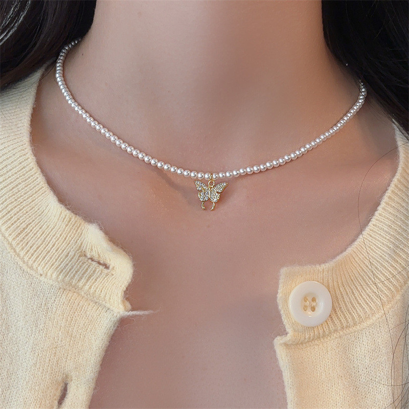 Vòng cổ ngọc trai mặt dây chuyền hình bướm sang trọng và đa dụng