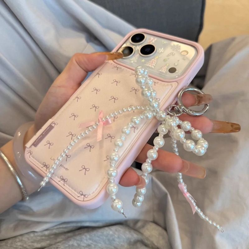 Mặt dây chuyền nơ ngọc trai Thích hợp cho vỏ điện thoại Apple iPhone17promax 15 nữ 16 nơ 14 hợp thời trang
