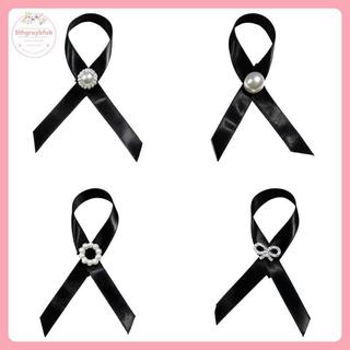 Sản phẩm gồm 2 chiếc ruy băng tang lễ với pin huy hiệu thổ cẩm màu đen, phù hợp cho tưởng niệm.