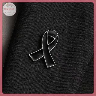 Sản phẩm gồm 2 chiếc ruy băng tang lễ với pin huy hiệu thổ cẩm màu đen, phù hợp cho tưởng niệm.