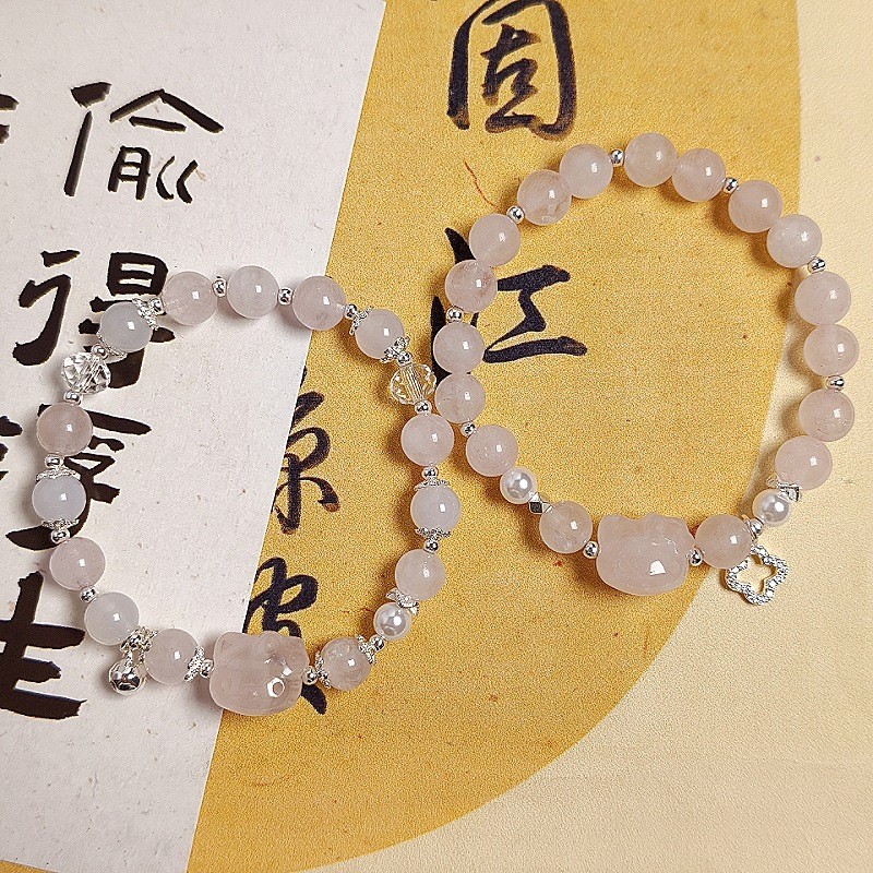 Vòng tay mèo KT pha lê hồng tươi và tự nhiên
