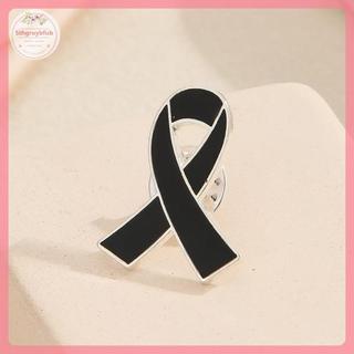 Sản phẩm gồm 2 chiếc ruy băng tang lễ với pin huy hiệu thổ cẩm màu đen, phù hợp cho tưởng niệm.
