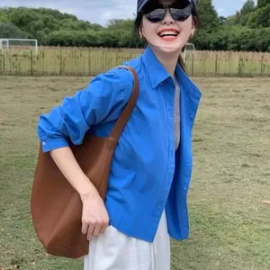 Áo sơ mi nữ thu đông màu xanh klein, thiết kế retro phong cách Hàn Quốc từ cotton nguyên chất