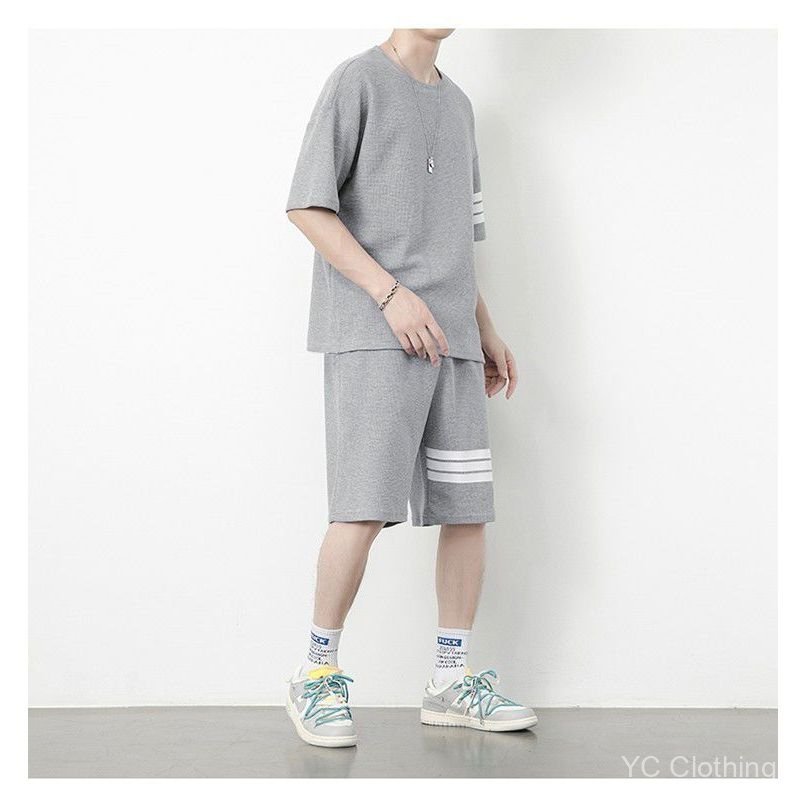 Áo thun ngắn tay có vách ngăn dành cho nam, quần short in hình dáng rộng bằng lụa băng mùa hè, bộ đồ thể thao trẻ trung đa năng thông thường QAGD