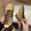 Baotou Nửa Dép Nữ Mặc Ngoài 2026 Siêu Nóng Đế Bằng Slip-On Lười Nửa Hỗ Trợ