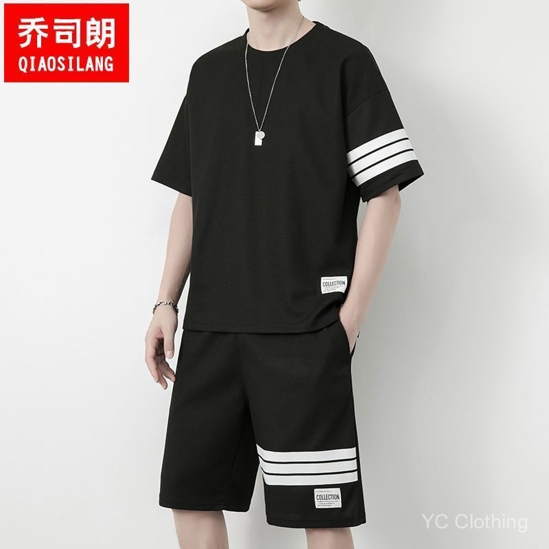 Áo thun ngắn tay có vách ngăn dành cho nam, quần short in hình dáng rộng bằng lụa băng mùa hè, bộ đồ thể thao trẻ trung đa năng thông thường QAGD