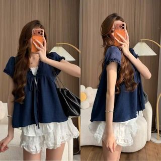Áo babydoll mùa hè 2 lớp đũi hàn cổ V tay ngắn thắt nơ phối ren xinh xắn dành cho nữ 2026