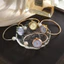 Đồng hồ chuyển màu mặt mẹ-of-Pearl dành cho sinh viên Phiên bản Hàn Quốc Đơn giản Phù hợp với đồng hồ đeo tay mở nhỏ 26.5.15