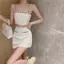 Mùa hè 2026 Phong cách mới Phong cách Chanel Hot Girl Sling Tube Top + Bộ đồ váy hông dệt kim nửa chiều eo cao