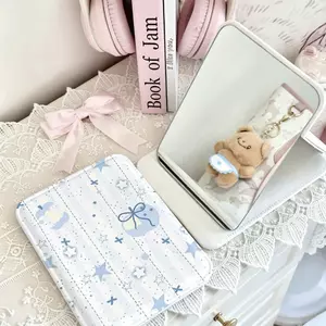 Gương cầm tay họa tiết nơ sao đơn giản thời trang chống trầy cầm tay tiện dụng