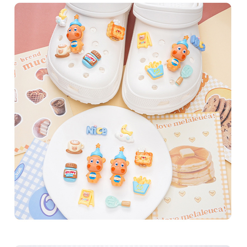Phụ kiện giày lỗ Pop Mart Bơ đậu phộng Starman Khóa giày Thích hợp cho Crocs Khóa giày giác quan cao cấp có thể tháo rời Khóa giày lỗ Khóa giày Busch Khóa giày Zhibixing ins Hoa giày